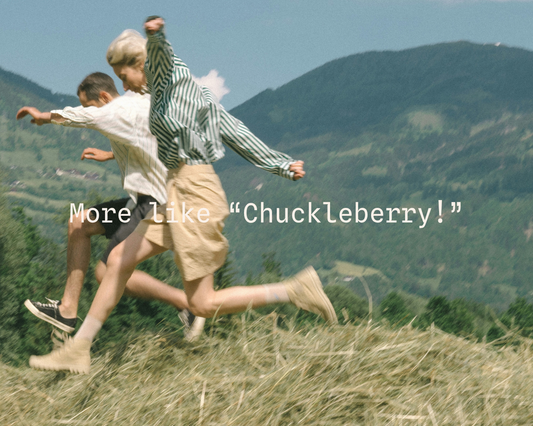 People jumping through a field after enjoying Wyld Huckleberry Gummies