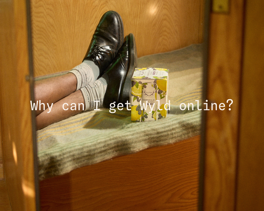 Person relaxing with Wyld Blackberry lemon THC Sparkling Waters